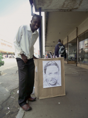 A man takes a drawing by Spunk Seipel, Harare. Photo by Spunk Seipel.