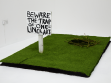 Beth Fox 'One-Liner Art'  2012, wooden sign, turf, branches, charcoal dimensions variable